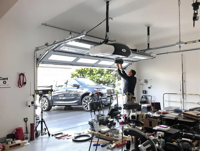 Fairhaven Garage Door Repair specialist installing smart garage door opener system in Fairhaven home
