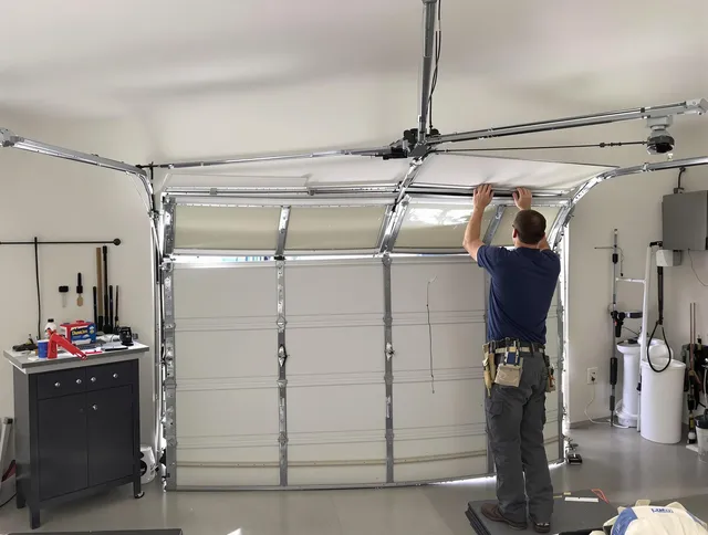Fairhaven Garage Door Repair specialist performing precise section replacement on Fairhaven garage door